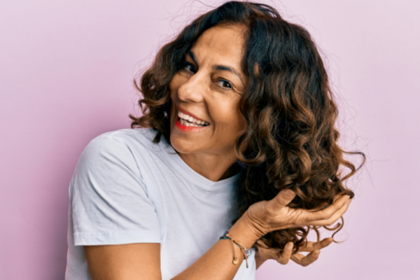 woman bouncing curly hair