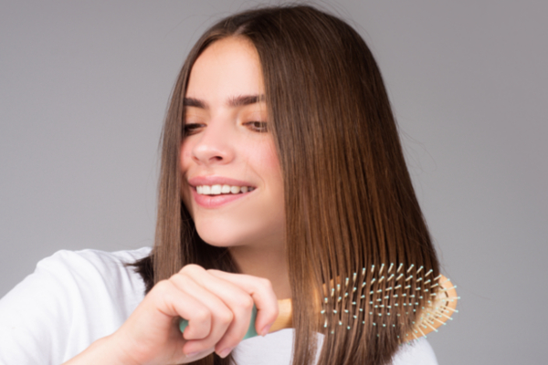 woman brushing hair